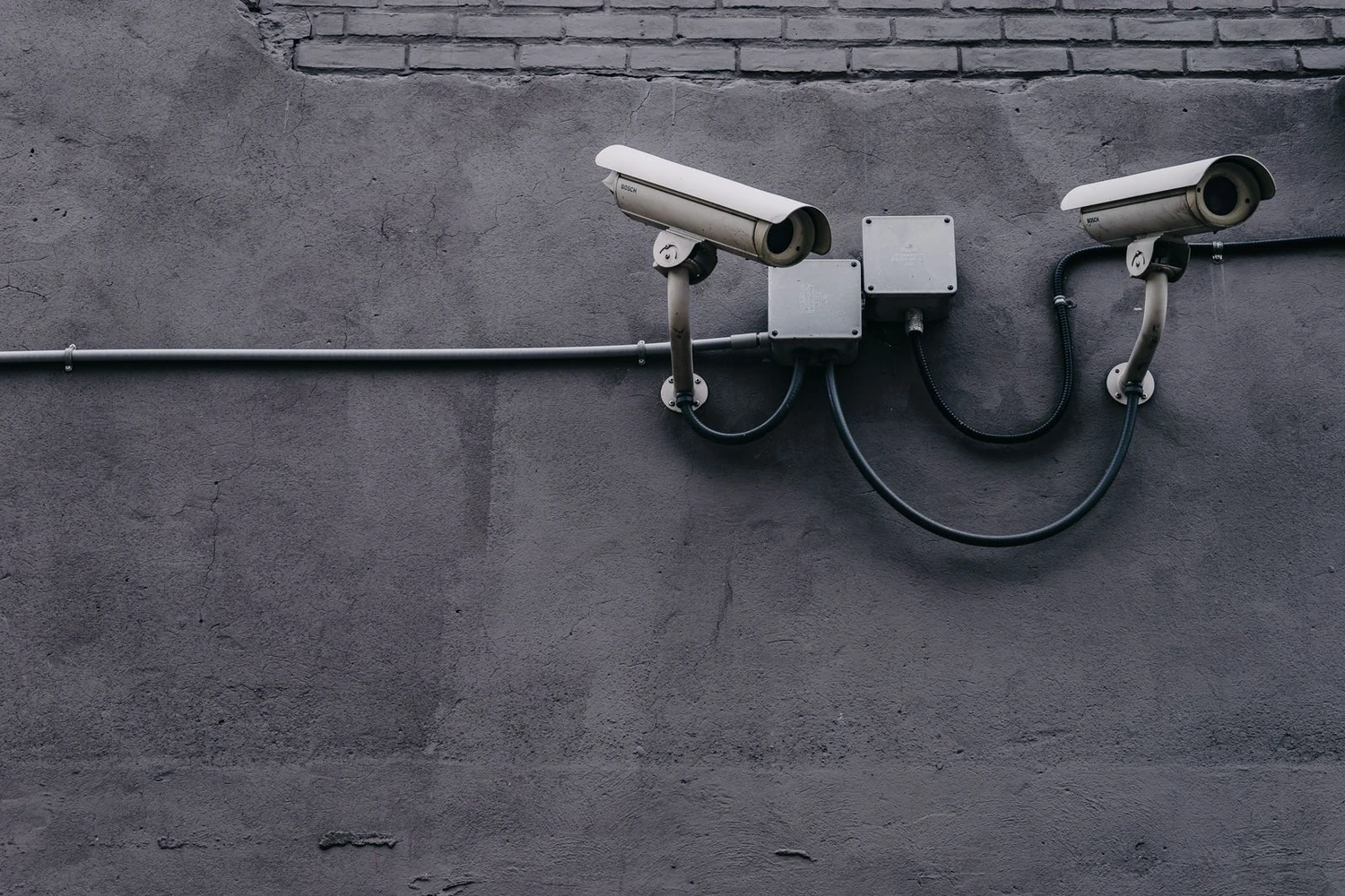 Wall-mounted security cameras